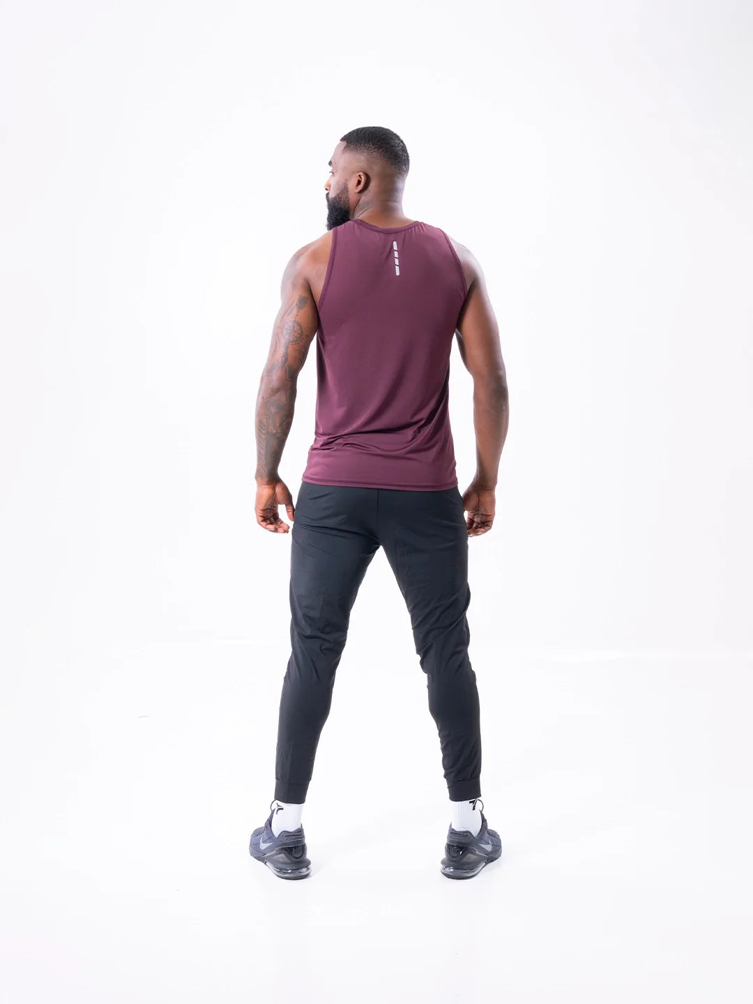 CAMISILLA RUNNING HOMBRE - VINOTINTO