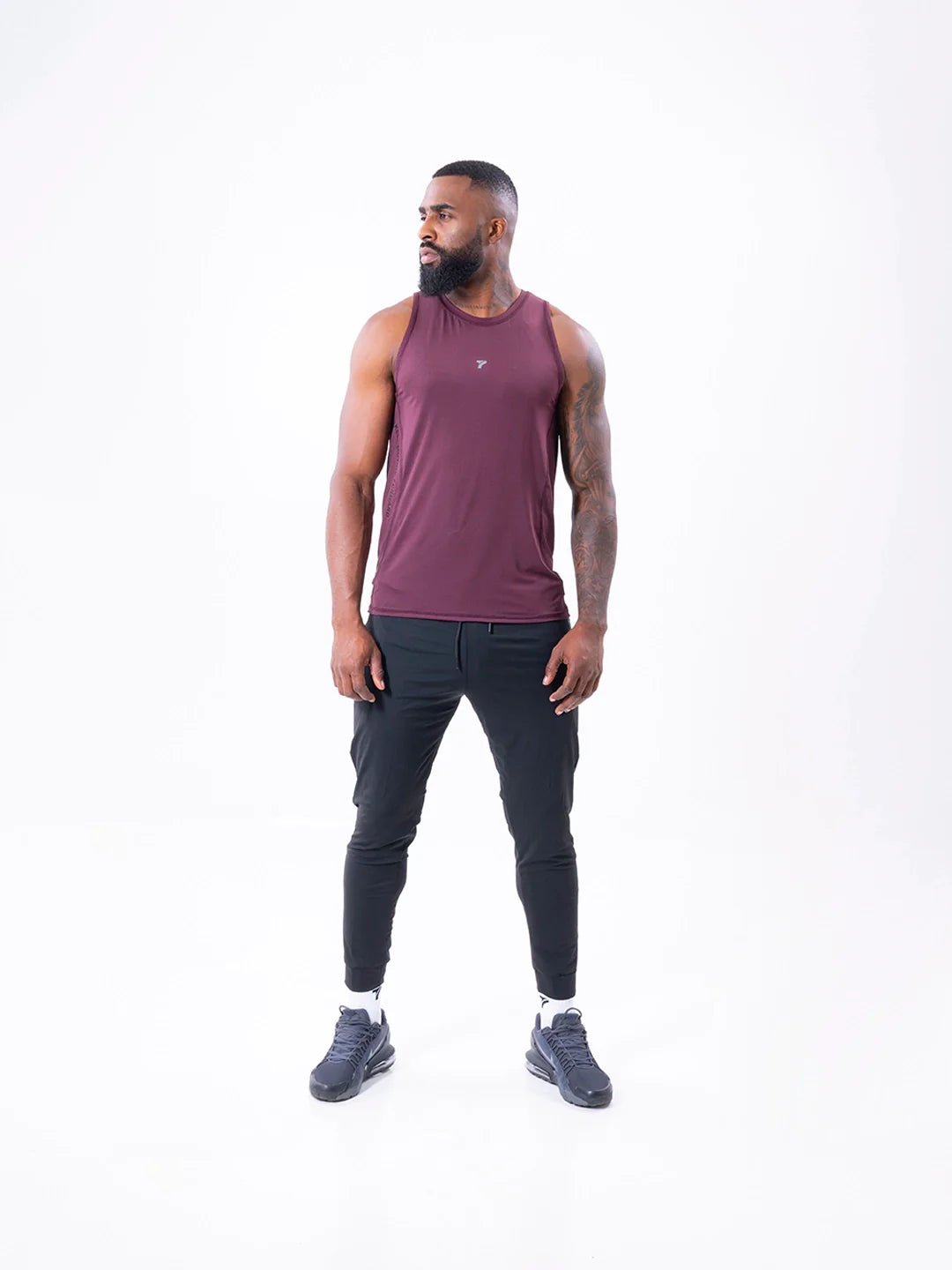 CAMISILLA RUNNING HOMBRE - VINOTINTO